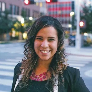 Abby Alvarez Smith, Realtor, eXp Realty, smiling in a professional headshot