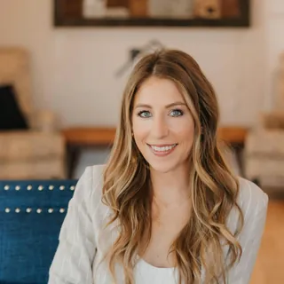 Brooke Pitkin, Realtor at Bricks and Branches Realty, smiling in a professional headshot